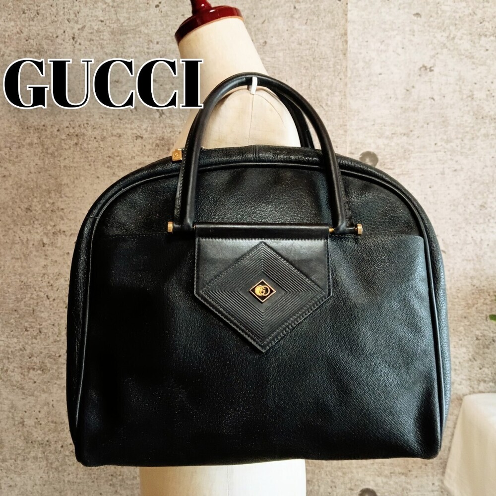 Gucci tote bag prominent diamond shaped front pocket Black